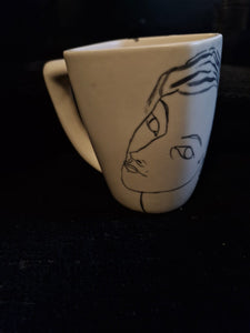 Taza Cara